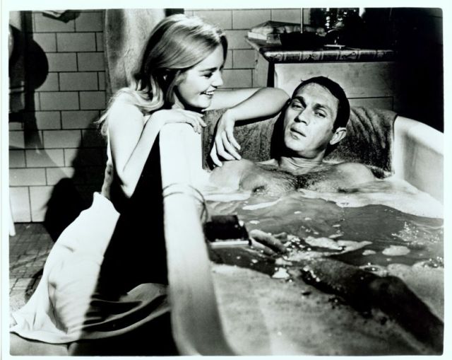Christian (played by Tuesday Weld) 
talks to Eric (McQueen), as he bathes in tub.